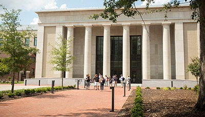 Students coming out of the School of Law building.