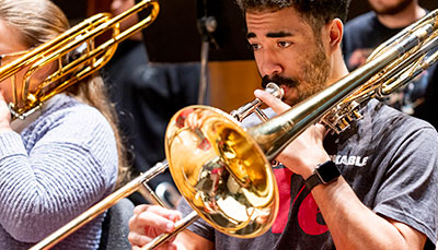 Jazz student playing the trombone. 